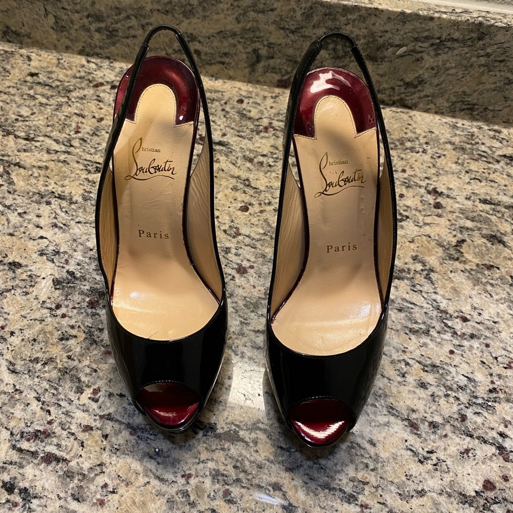 Christian Louboutin black sling back pumps